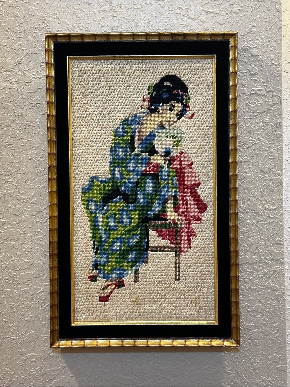 Vintage framed needlepoint portrait of a traditional Japanese geisha